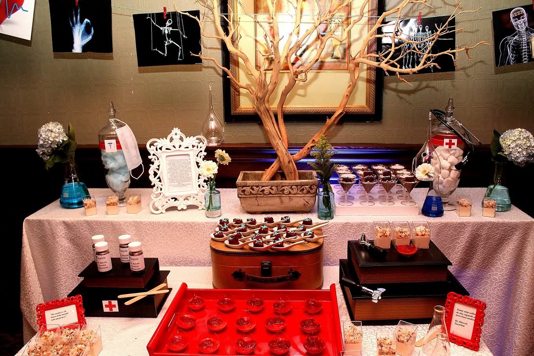 Themed dessert and appetizer table with a manzanita branch centerpiece for a private event
